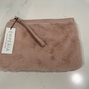 Pink furry wristlet pouch